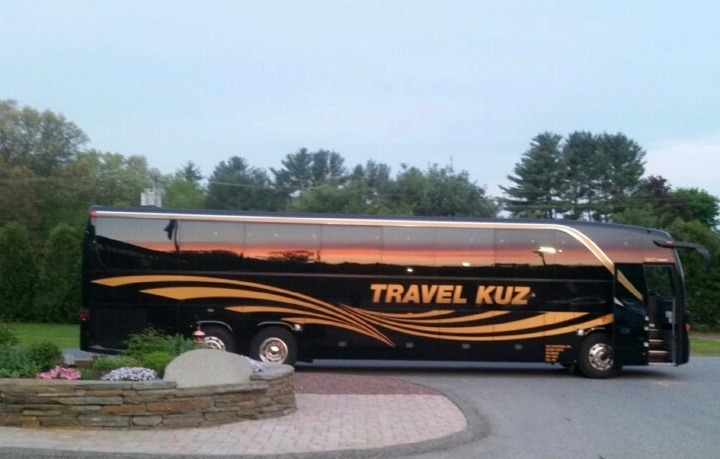 Group of soccer fans traveling by charter bus from the Pioneer Valley to Gillette Stadium for a 2026 FIFA World Cup match with TravelKuz
